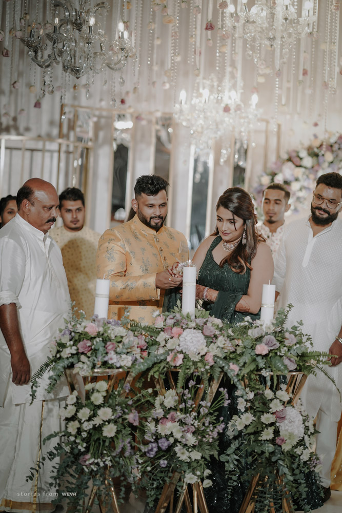 Couple lighting the candle