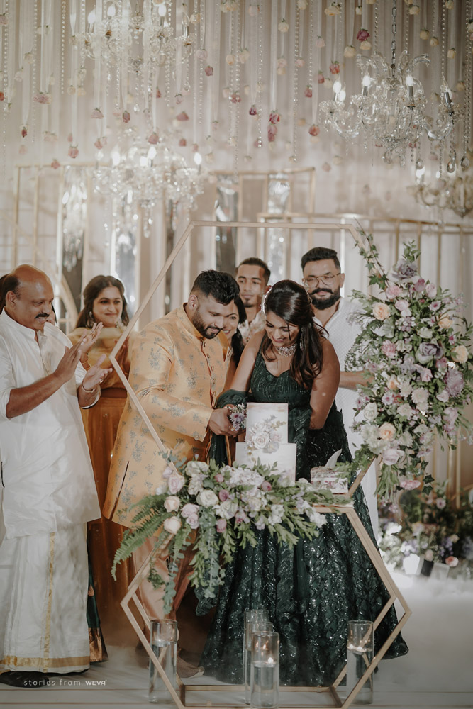 Couple cutting cake on the engagement day.